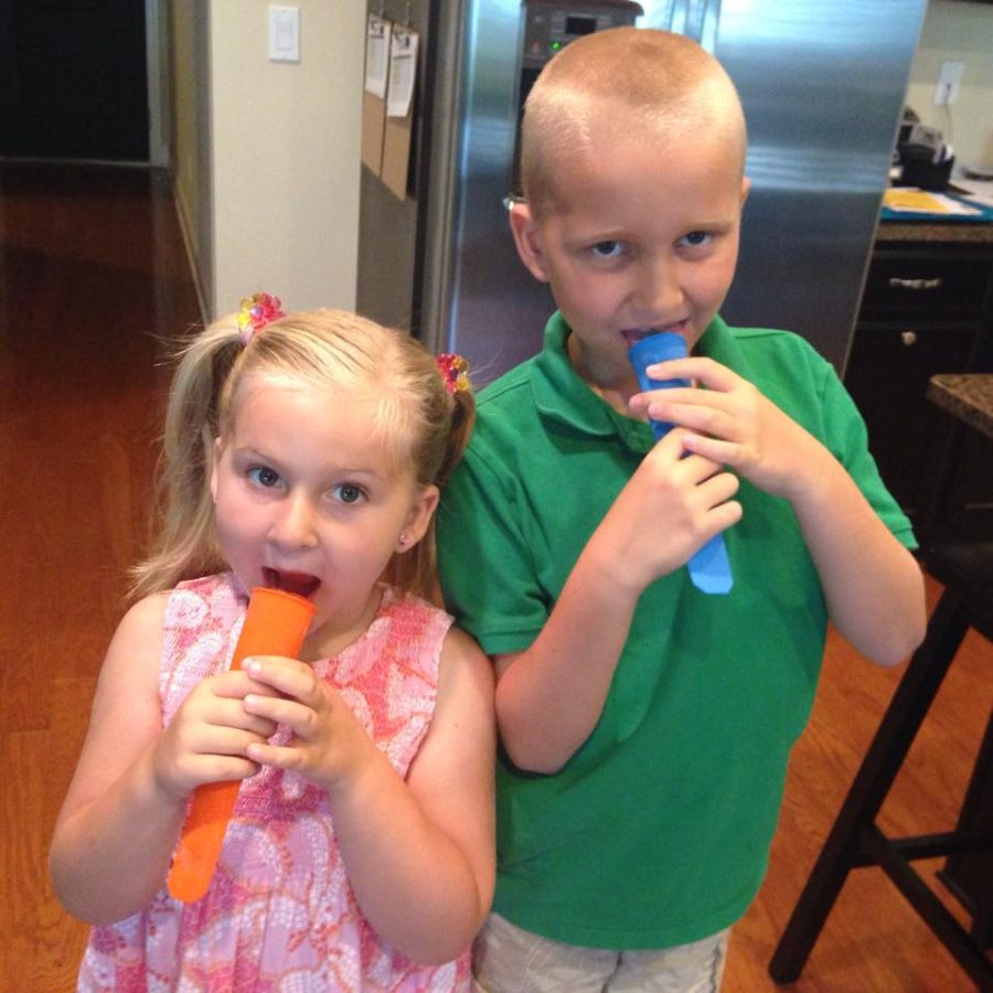JMB Contributer, Shannon's kiddos, Kiley & Cole enjoying some juice pops in the KitchCo molds.