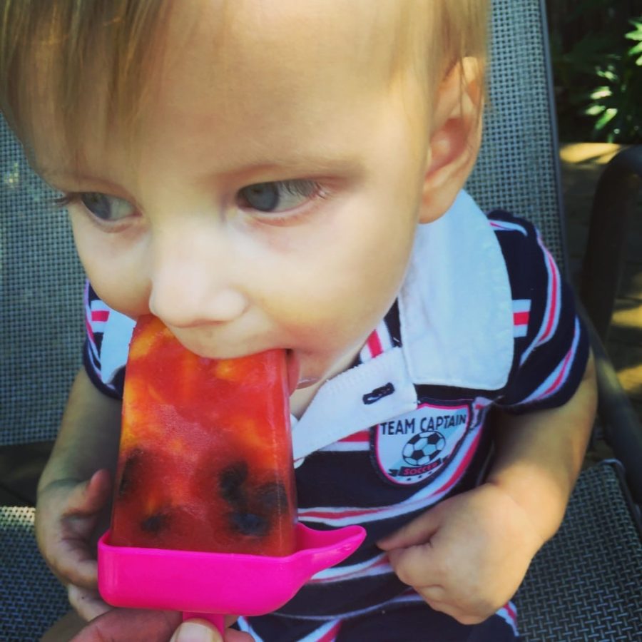 My big boy, Evan, enjoying his first popsicle