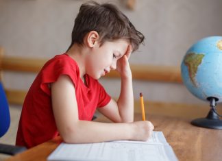 The Psychology Behind Your Child’s Report Card report card