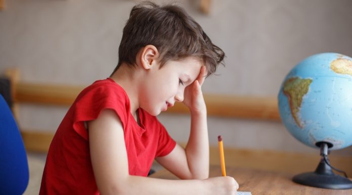 The Psychology Behind Your Child’s Report Card report card